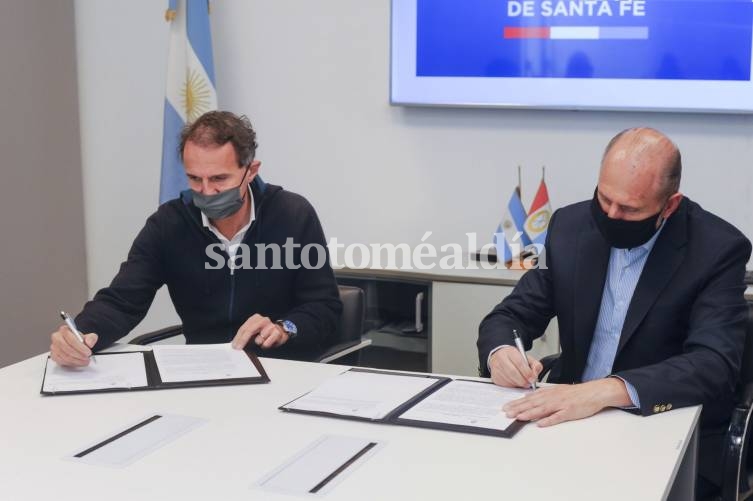 Katopodis y Perotti, durante la firma del convenio. (Foto: Gobierno)